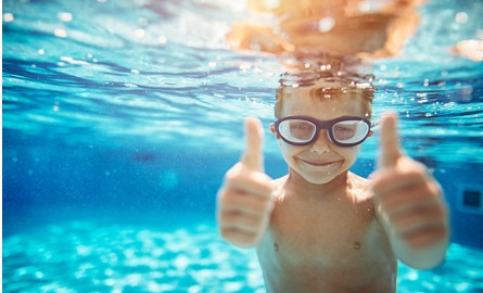 little boy in pool