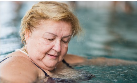 older woman in pool
