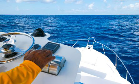 man driving boat