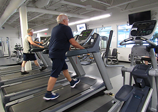 two men on treadmill