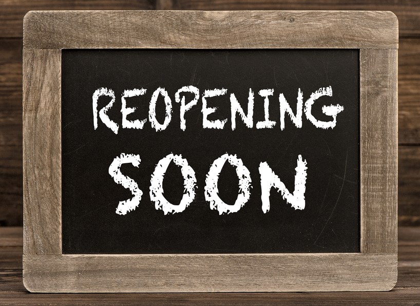 sign with reopening soon on it