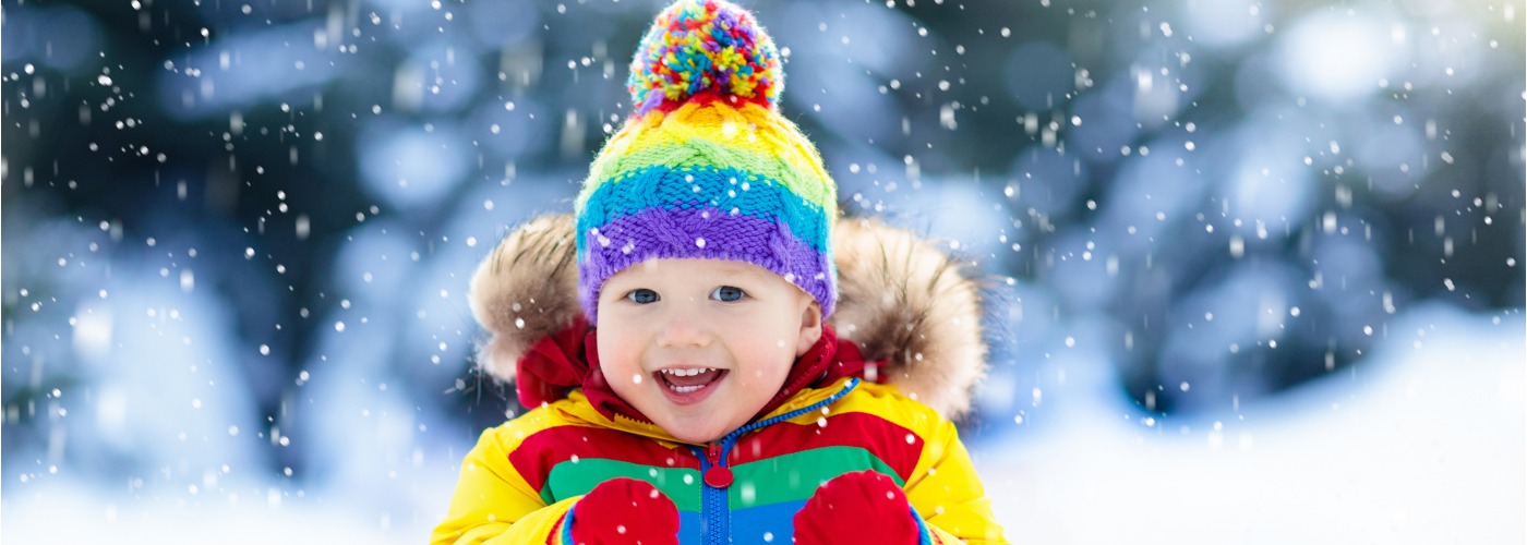 child playing in snow