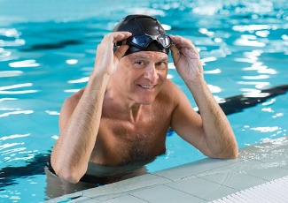 senior man swimming
